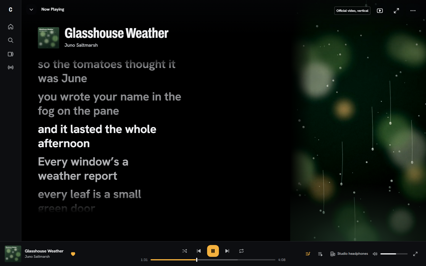 Design render of the desktop Now Playing screen: synced lyrics on the left, a rainy green official video on the right
